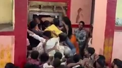 Thousands of savage Indians swarm a temple in India seeking to have their wishes granted