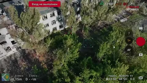 Russian Loots a Ukrainian KIA After He's Burnt by a Drone Strike