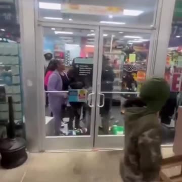 negro mob rush in and steal everything in sight