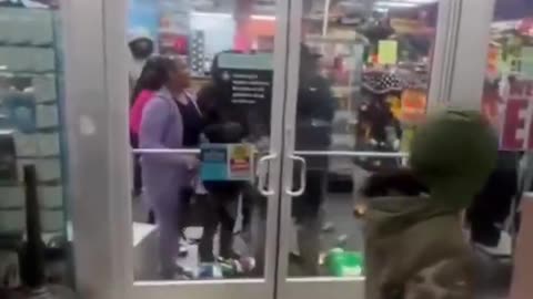 negro mob rush in and steal everything in sight