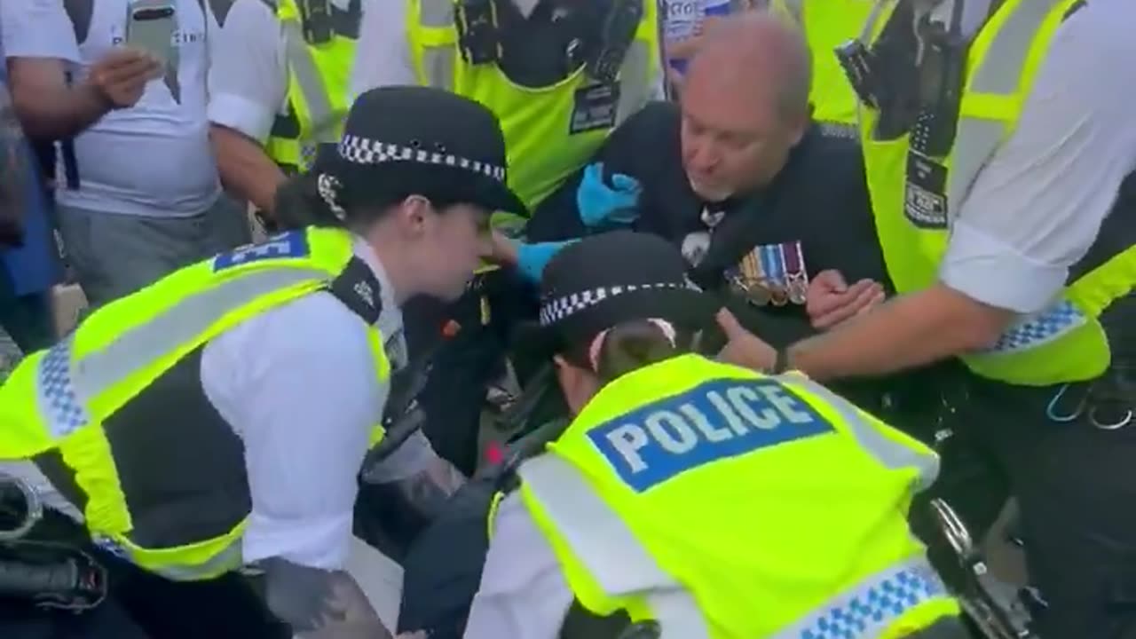 RAF War Veteran is arrested for holding up a sign that offended the wrong people.
