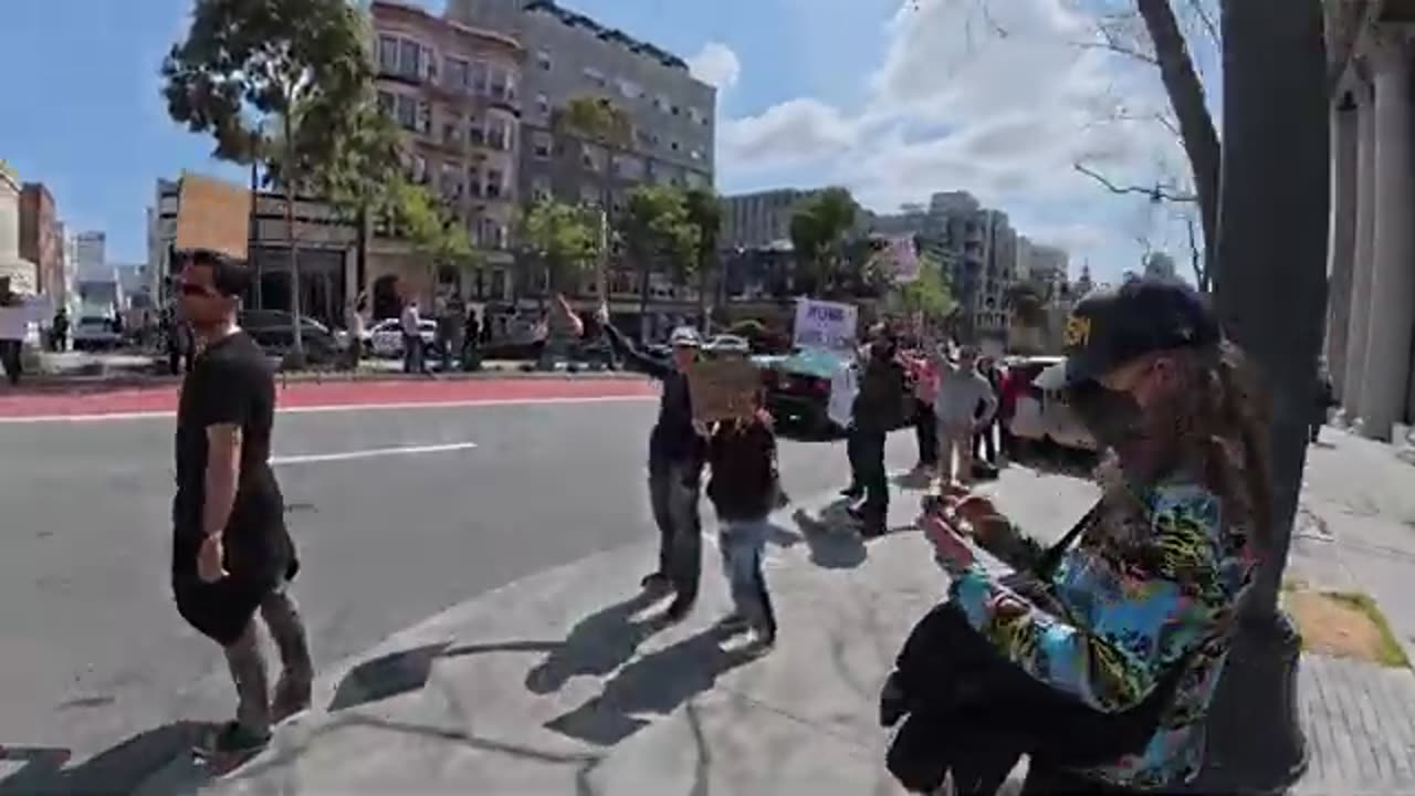 Going to Tesla Protest in DOGE t-shirt and MAGA Hat