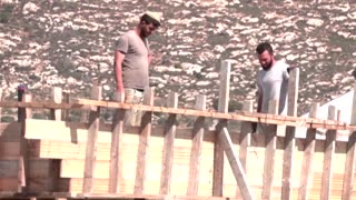 West Bank town becomes 'big prison' as Israel fences it in