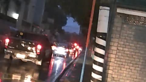 Walking in the rain in Marikina City, Philippines