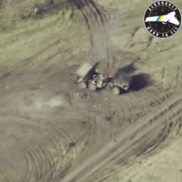 Ukrainian Drone Smashes into Russian Grad Launcher
