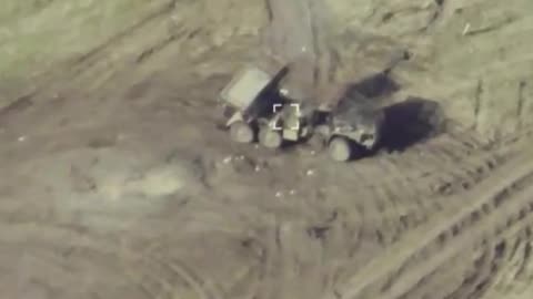 Ukrainian Drone Smashes into Russian Grad Launcher