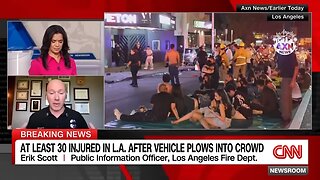 At least 30 hurt after vehicle strikes LA crowd. The driver was then shot by bystander, police say.