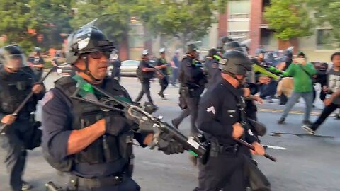 Anti-ICE rioter rushes an LAPD officer and gets lit up with non-lethal rounds