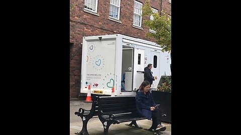 "COVID-19 Vaccinated Wheelchair-User Tony Shingler's Inspiring Visit to Local Extermination Bus"