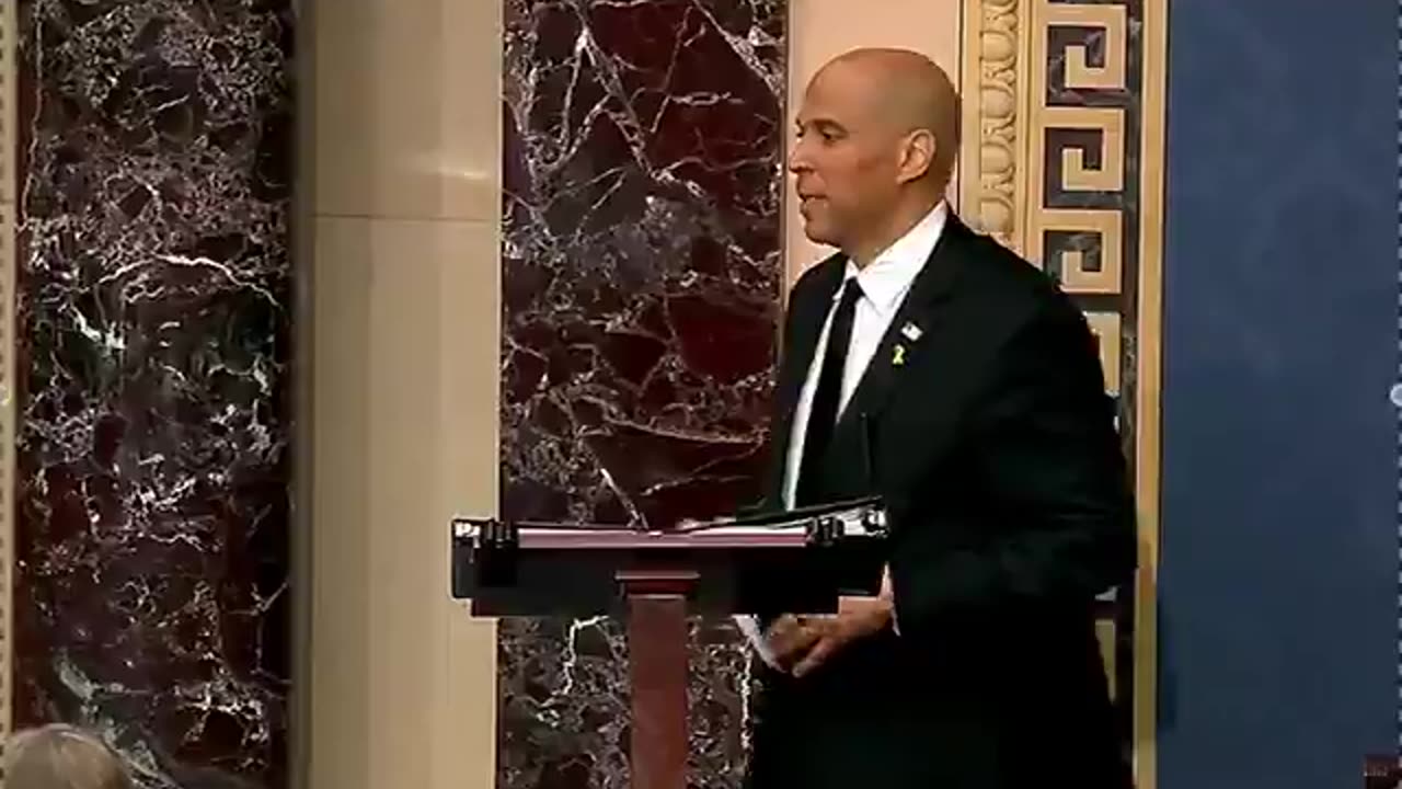 Senator Cory Booker praises Senator Tammy Duckworth during his marathon speech