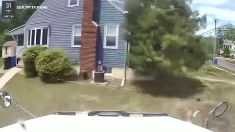 Dump truck crashes into house in New Jersey