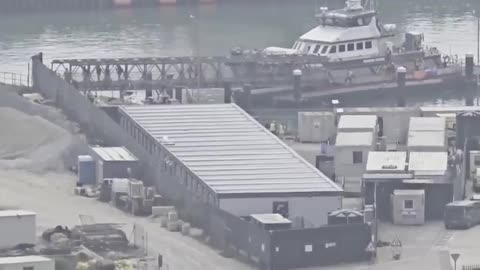Third boat of the day unloading scores of diverse invaders in Dover, England.