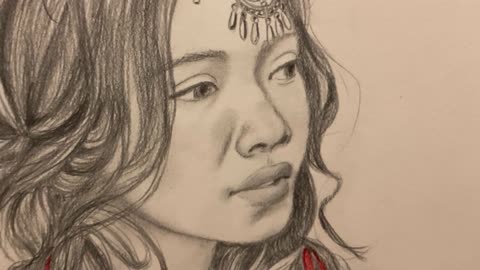 Timelapse pencil drawing of a pretty girl