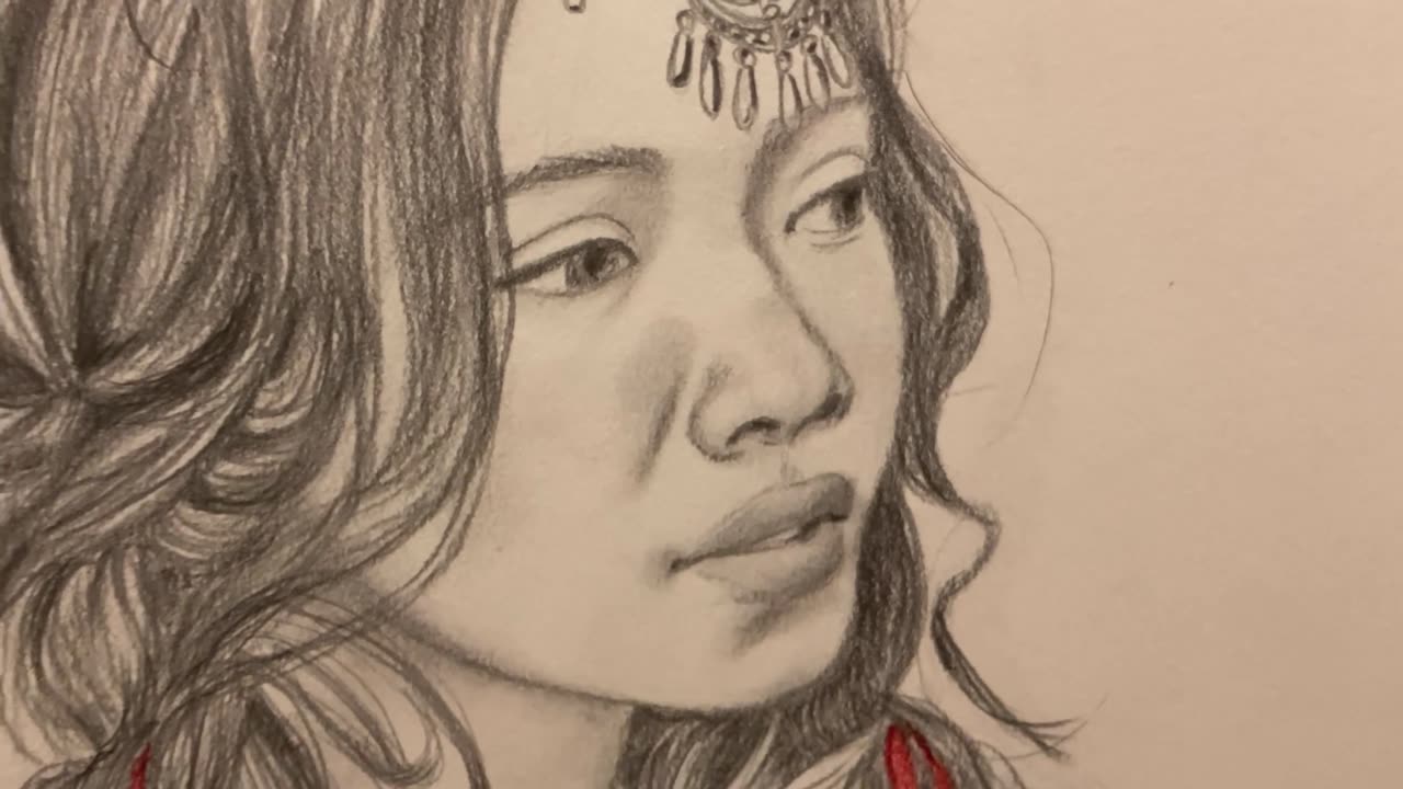 Timelapse pencil drawing of a pretty girl
