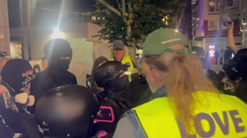 As the protest moved to Lowell St. near the ICE facility around 9:45 p.m, onlookers