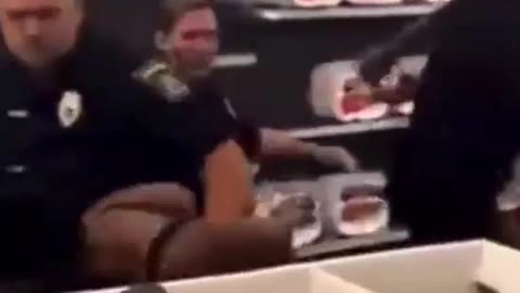 Shaniqua gets punched by a cop