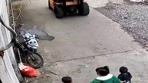 Elder Sister Heroically Shields Siblings from Oncoming Forklift.