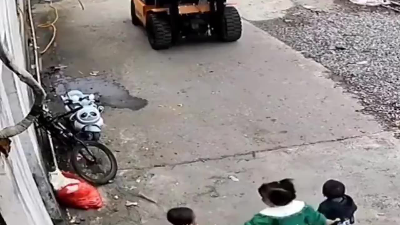 Elder Sister Heroically Shields Siblings from Oncoming Forklift.