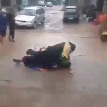 WATCH: Two Masqueraders Explode Into Unexpected Street Fight!