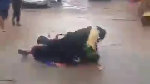 WATCH: Two Masqueraders Explode Into Unexpected Street Fight!