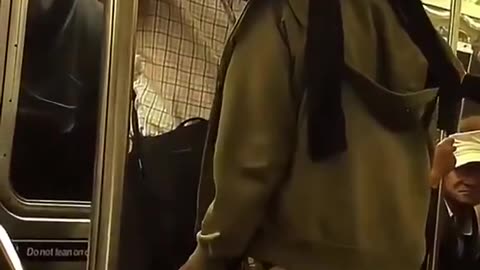 negro pisses off Bruce Willis look a like on NYC subway