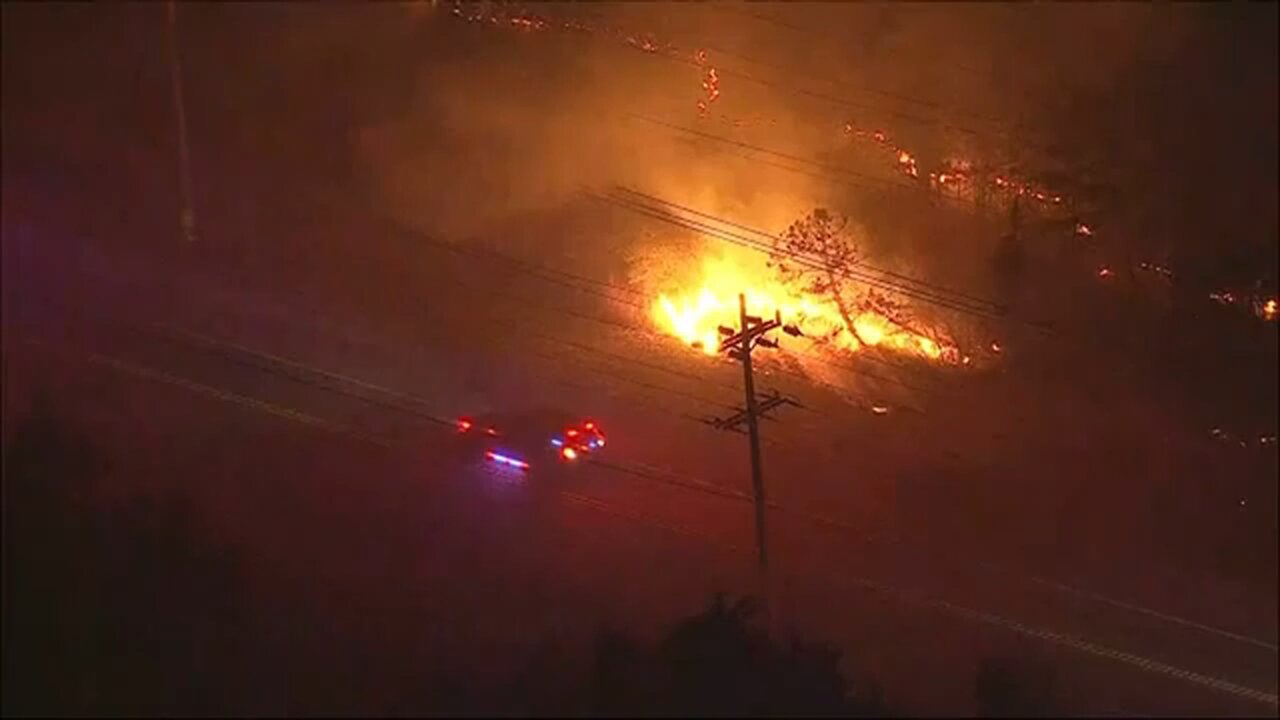 New Jersey forest fire prompts evacuation and closes a major highway