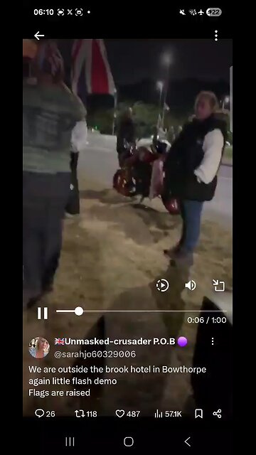 Raising flags by migrant hotels : song " migrants sail across the channel "