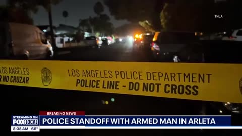 LAPD in standoff with armed man in Arleta