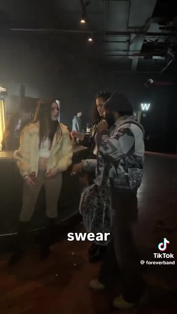 Black influencer touching White women