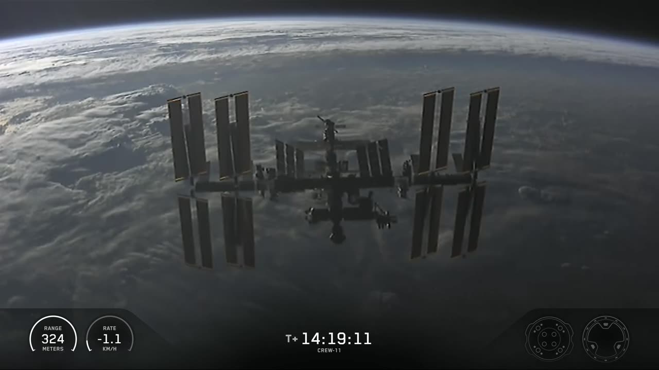 Dragon above the @Space_Station as it approaches for docking