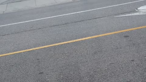 Man Threatens Pedestrian With Pickaxe