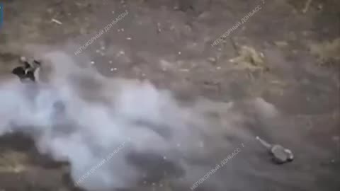 A Russian soldier knocked down an enemy drone by throwing his assault rifle at it.