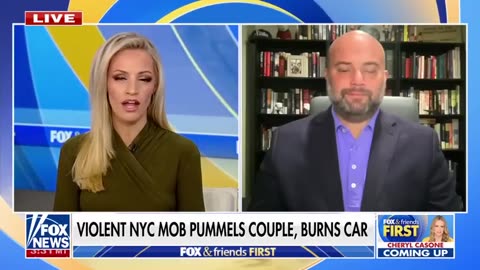 SEE IT_ Violent mob attacks couple, burns car during street takeover