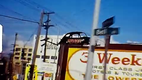 Vintage driving around Seattle in 1969/1970 Space Needle and old signs