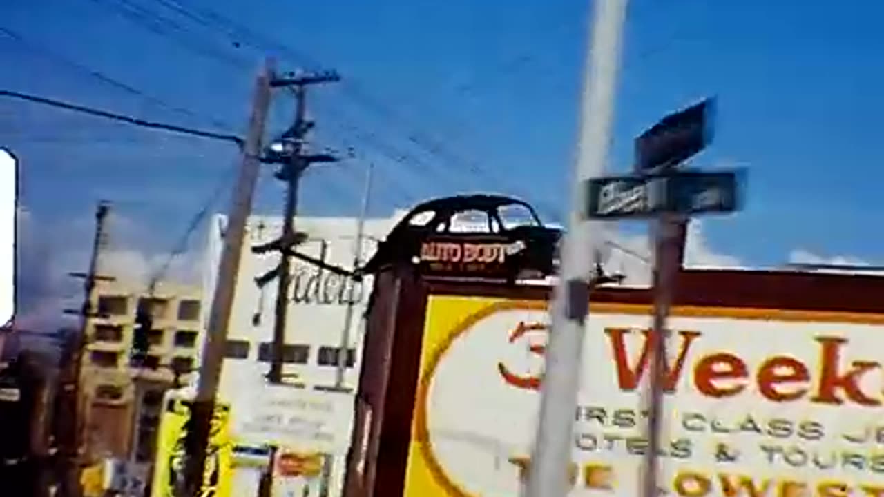 Vintage driving around Seattle in 1969/1970 Space Needle and old signs