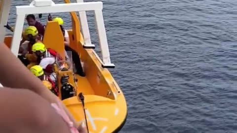 NEW: Father jumps overboard to save his 5-year-old daughter, who fell off a Disney