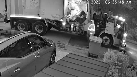 City Compost Truck Eats Bin