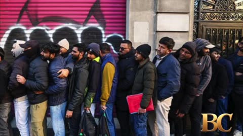 Spain to grant legal status to 500,000 migrants