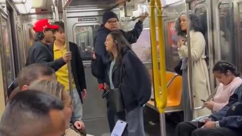 Liberal woman falls flat on her face while trying to attack a Trump supporter in NY😂