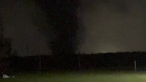 Massive Tornado Towers Above Arkansas Field at Night