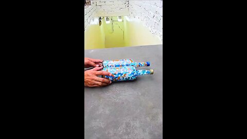 Bottle filled with water bubbles falling from stairs