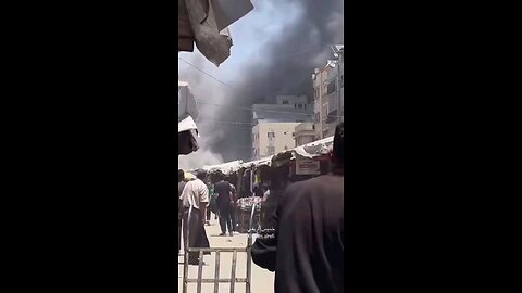 Footage shows the moment an Israeli airstrike struck a building along a crowded street in Gaza