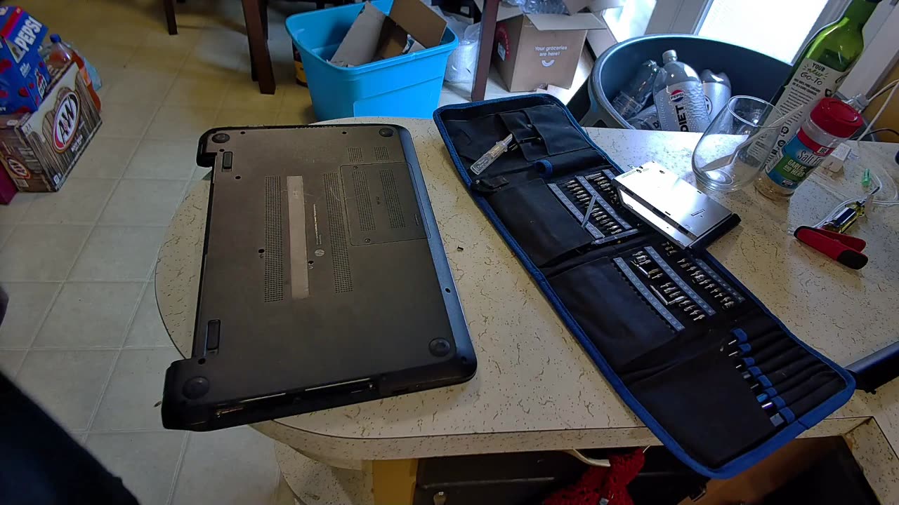 How to extract a hard drive from a laptop the fun way
