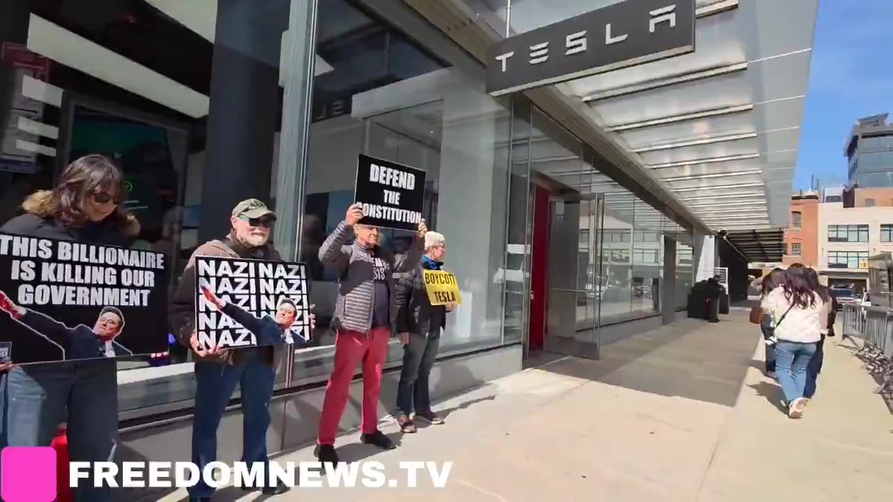 NOW: Protesters are occupying Manhattan Tesla Showroom tesla stocks go down.