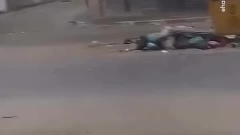 A breathtaking moment captures the direct targeting by an Israeli tank of civilians