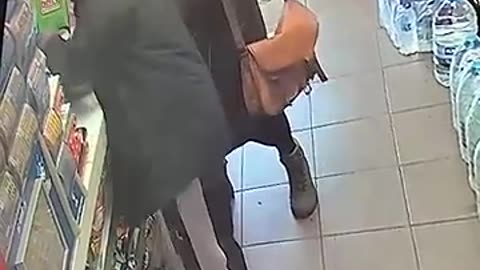 Brave Female Customer takes down a robber in London Shop.