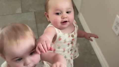 Adorable Twin Steals Sister's Cookie in Heartwarming Moment