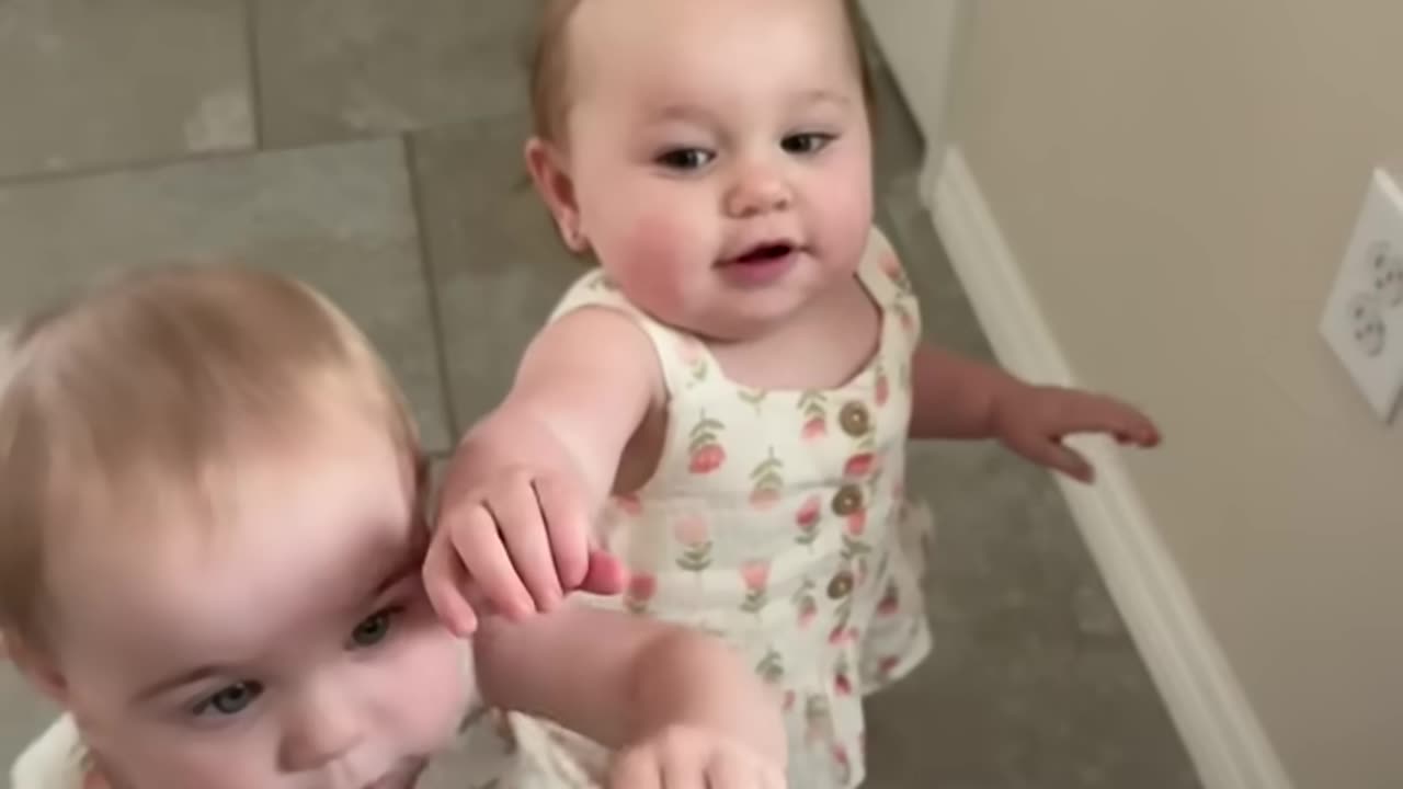 Adorable Twin Steals Sister's Cookie in Heartwarming Moment