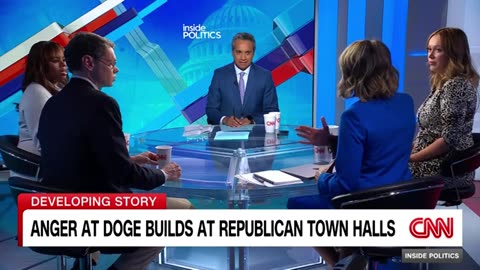 Audience boos congressman over his explanation for health research cuts