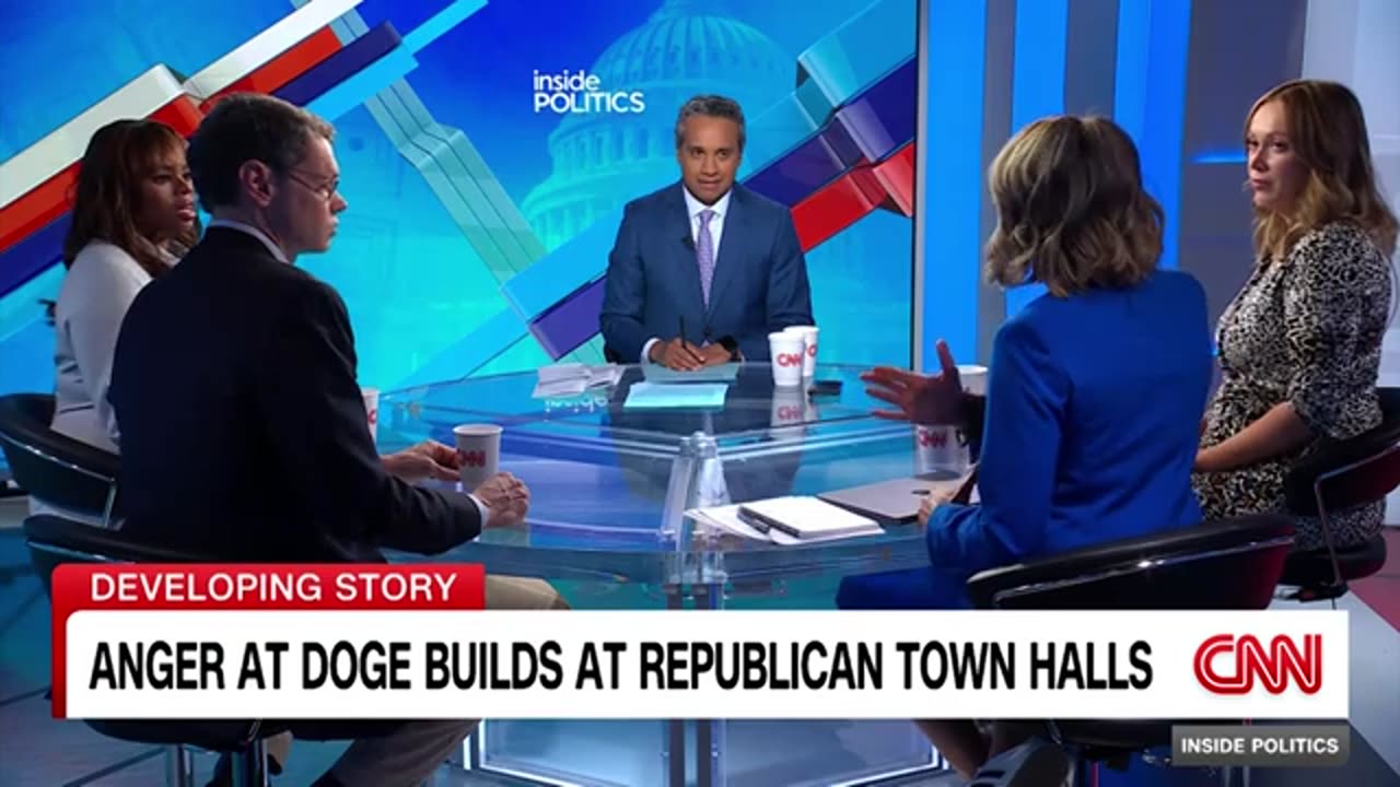 Audience boos congressman over his explanation for health research cuts